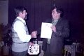 Schuetzen-1984-0625.jpg  Vereins- und Firmenschießen  Es gratuliert 1. Vorsitzender Herrmann Oldenburg zum  14. Platz, Thomas Hartwig, DRK